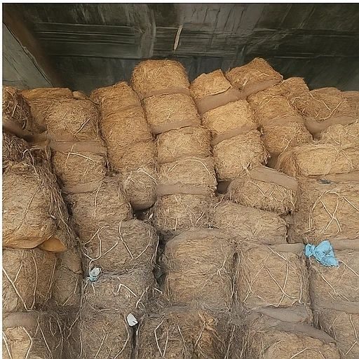 Tobacco bales stacked inside a container